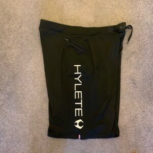Athletic shorts with side zip pockets. Size large